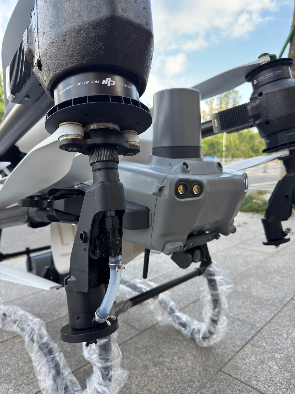 Arm & atomising nozzle